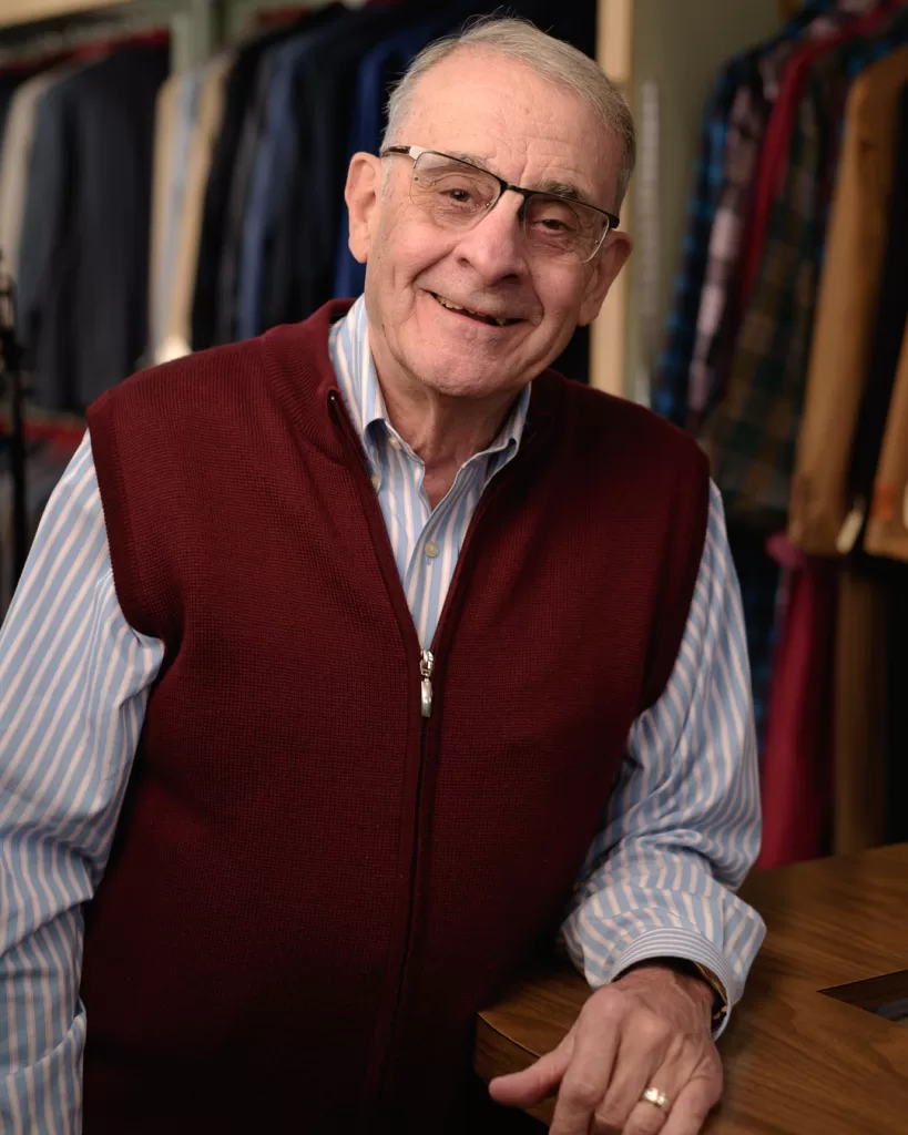 A portrait of Paul Gencarella, owner of Toscano's Mens Shop in Westerly, Rhode Island by professional photographer Andy DelGiudice