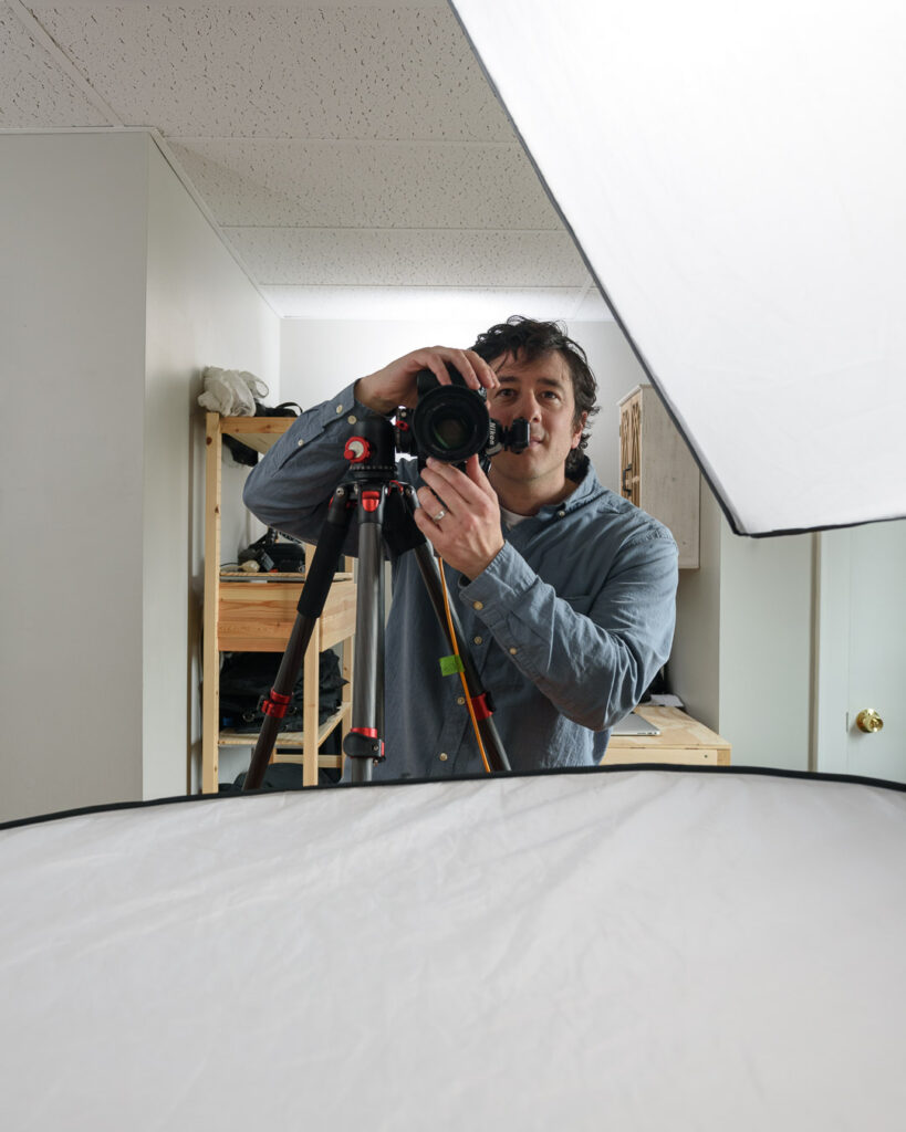 A photo of headshot photographer Andy DelGiudice from the perspective of the person being photographed
